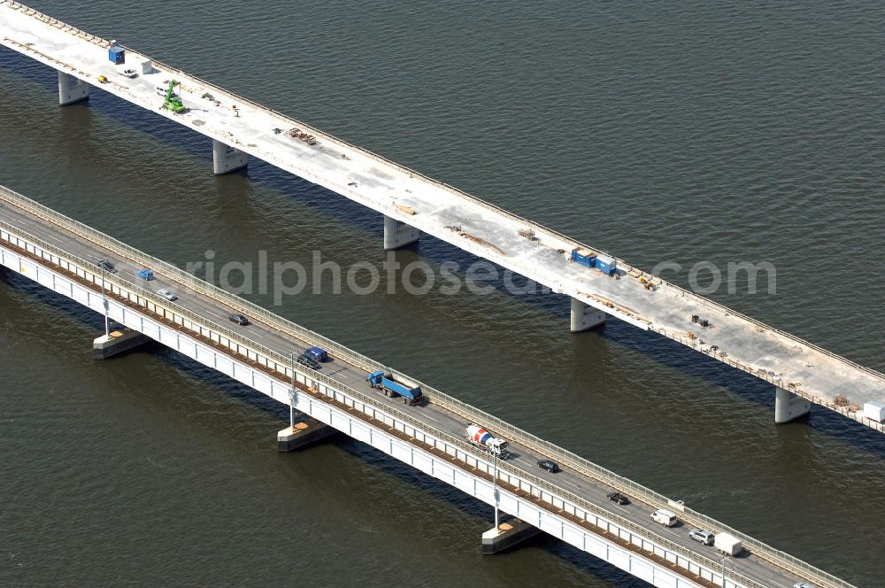 Stralsund from the bird's eye view: Blick auf die Strelasundquerung.So wird die heute als feste Verbindung der Insel Rügen zum vorpommerschen Festland bestehende Querung des Strelasundes auf Höhe der Ortschaften Altefähr auf Rügen und der Hanse- und Weltkulturerbestadt Stralsund genannt. Über die erste feste Strelasundquerung, die „Rügendamm“ genannt wird, führen die Bundesstraße 96, eine eingleisige Eisenbahnstrecke und ein kombinierter Fuß- und Radweg.