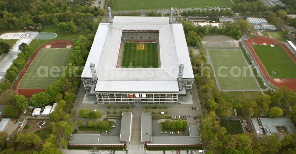 Aerial photograph Köln - Blick auf das Rhein Energie Stadion, die Heimspielstätte des 1. FC Köln im Stadtteil Müngersdorf. Sein Vorläufer war das an gleicher Stelle erbaute Müngersdorfer Stadion. Durch einen Sponsorenvertrag trägt das Stadion derzeit den Namen des Kölner Energieversorgers RheinEnergie. The RheinEnergieStadion is a football stadium in the district of Cologne Mungersdorf. It is the home ground of the football club 1. FC Koeln.