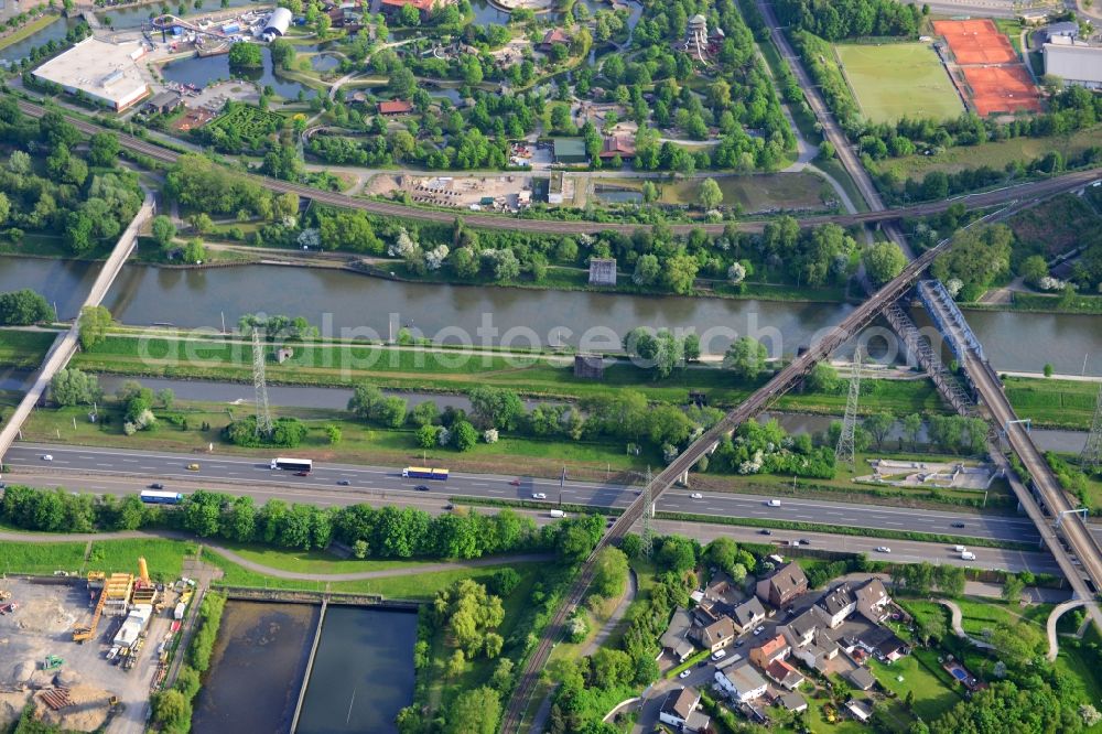 Oberhausen from above - View from north to south across the Rhine-Herne-Canal with the Tausendfuessler bridge, a foot- and bisycle bridge, and tow a railway bridges in Oberhausen in North Rhine-Westphalia