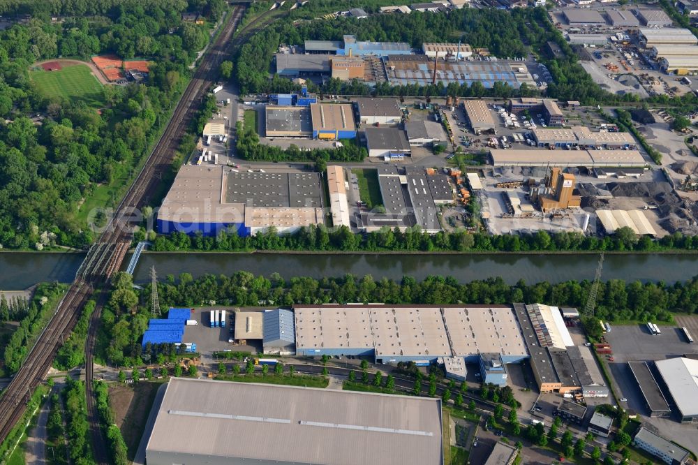 Oberhausen from above - View from north to south across the Rhine-Herne Canal at the industrial area Buschhausen with a foot- and bisycle bridge and a railway bridge in Oberhausen in North Rhine-Westphalia