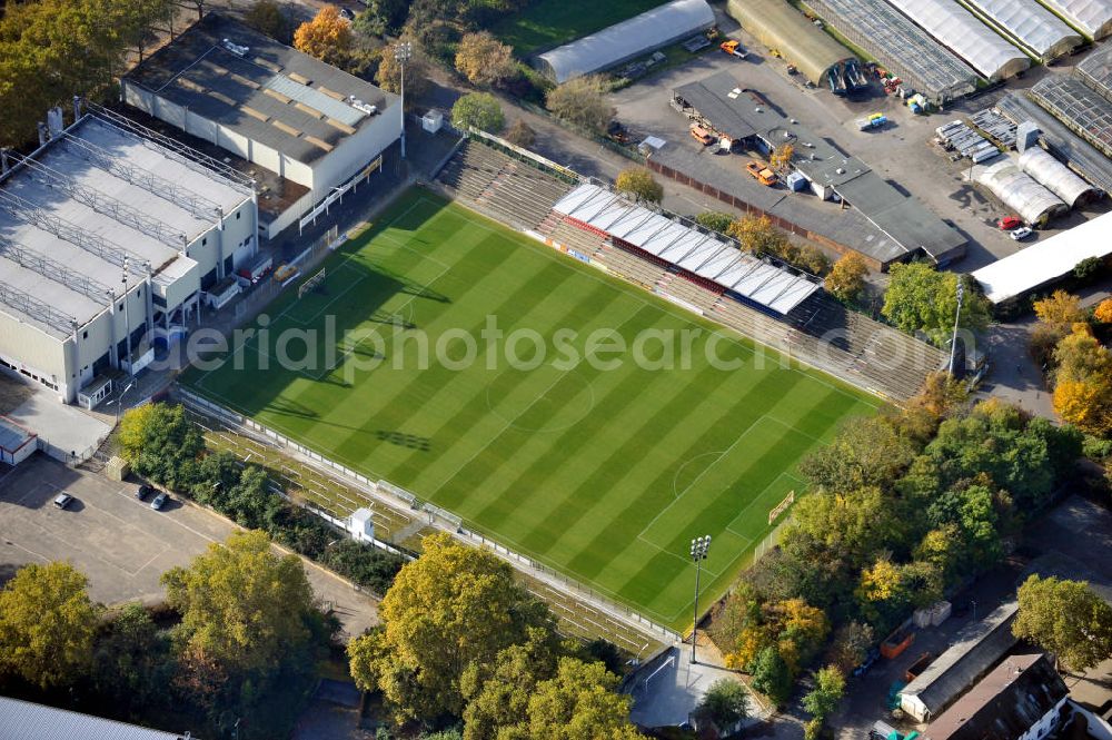 Aerial photograph Mannheim - Das Rhein-Neckar-Stadion in Mannheim Baden-Württemberg, ist die Heimspielstätte des VfR Mannheim und liegt direkt an der Theodor-Heuss-Anlage. Das Stadion ist ein reines Fußballstadion und verfügt über eine Flutlichtanlage. The Rhein Neckar Stadium in Mannheim Baden-Wuerttemberg, is the home playground of the VfR Mannhein and lays on the Theodor-Heuss-Anlage. The stadium is only for football and has floodlights.