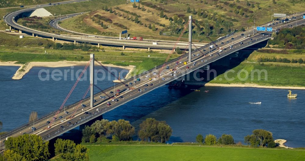 Leverkusen from the bird's eye view: Rhine Bridge - Highway bridge the BAB A1 - E37 in Wiesdorf district in Leverkusen in North Rhine-Westphalia