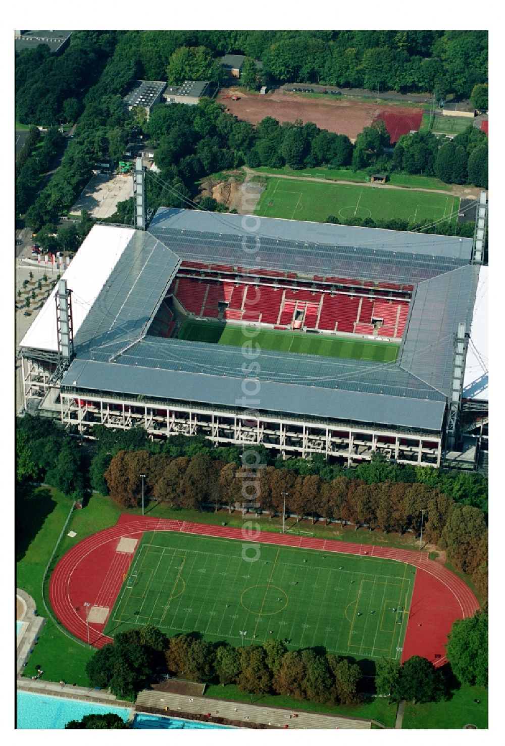 Köln from the bird's eye view: View at the RheinEnergieStadium in the district Muengersdorf in Cologne in the federal state North Rhine-Westphalia. The RheinEnergieStadion is the home ground of the 1. FC Koeln. Owner is the Koelner Sportstaetten GmbH