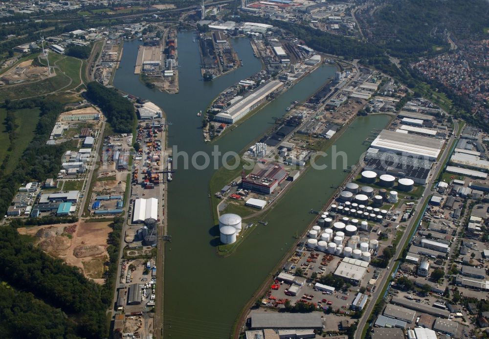 Aerial photograph Karlsruhe - The port Rheinhafen of the city Karlsruhe in the state Baden-Wuerttemberg is located in the district Muehlburg. The inland harbor provides access to the river Rhine and consists of six basins. It is operated by KVVH, short term for Karlsruher Versorgungs-, Verkehrs- und Hafen GmbH