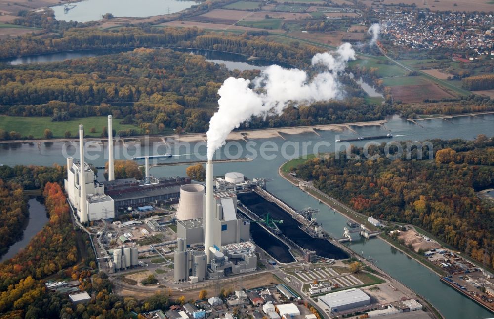 Karlsruhe from above - View of the harbor Rheinhafen, also called Stadthafen, on the middle Upper Rhine at Karlsruhe in Baden-Wuerttemberg. In the industrial area around the harbor are among other things the steam power plant Rheinhafen-Dampfkraftwerk of the Energie Baden-Wuerttemberg