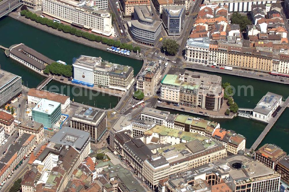 GENF from the bird's eye view: Blick auf eine der Inseln in der Rhône (Quai de I'lle und Quai de Moulins). Die beiden Stadtteile werden durch die Verkehrsbrücke miteinan der verbunden. Geneva 2007/07/16 Isle at the Rhône (Quai de I'lle and Quai de Moulins). Both parts of the town are connected through the bridge.