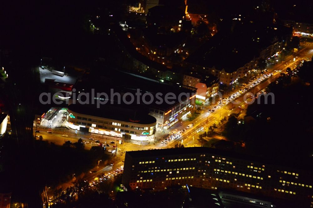 Berlin from the bird's eye view: Night image with view over the Ring Center at the Frankfurter Allee in Friedrichshain-Kreuzberg in Berlin