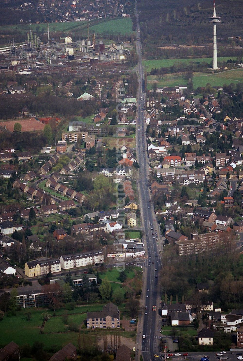 Moers from above - View of the Römerstrasse in Moers in North Rhine-Westphalia. Top left are the fuel works in which was already in the 40s coal converted into gasoline