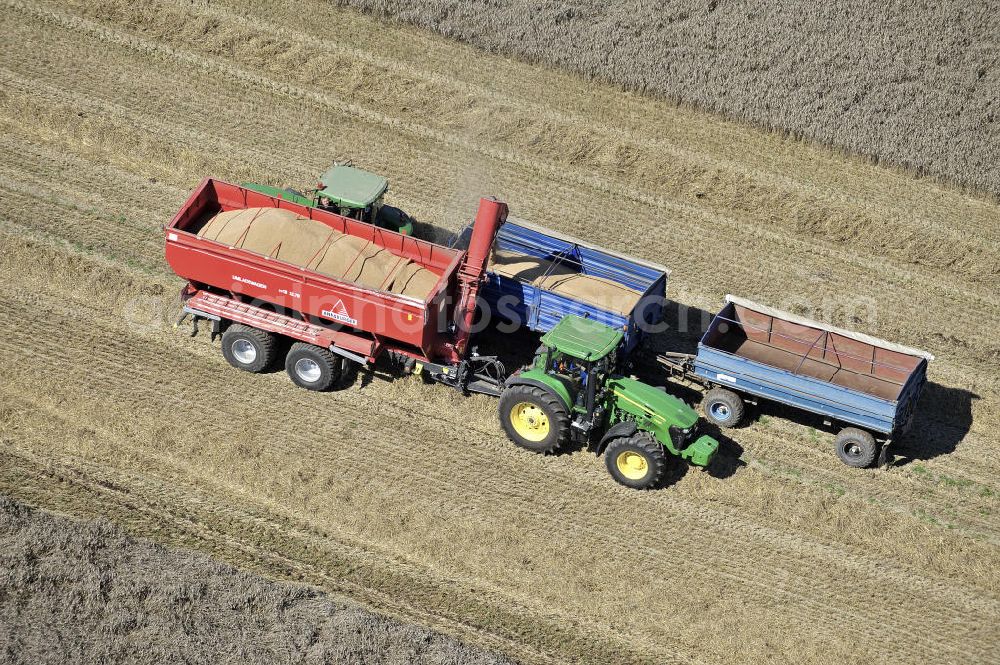 Beesenstedt from above - Mähdrescher beim Einsatz zur Herbsternte. Roggenernte in der Nähe von Beesenstedt. Harvest of rye near Beesenstedt.