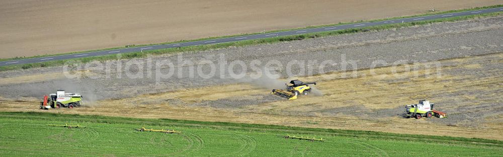 Beesenstedt from above - Mähdrescher- Einsatz zur hebstlichen Roggenernte auf einem Feld in der Nähe von Beesenstedt. Harvest of rye near Beesenstedt.