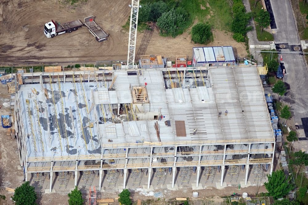 Berlin from above - Shell of a future six-story warehouse at Landsberger Allee in Berlin Lichtenberg