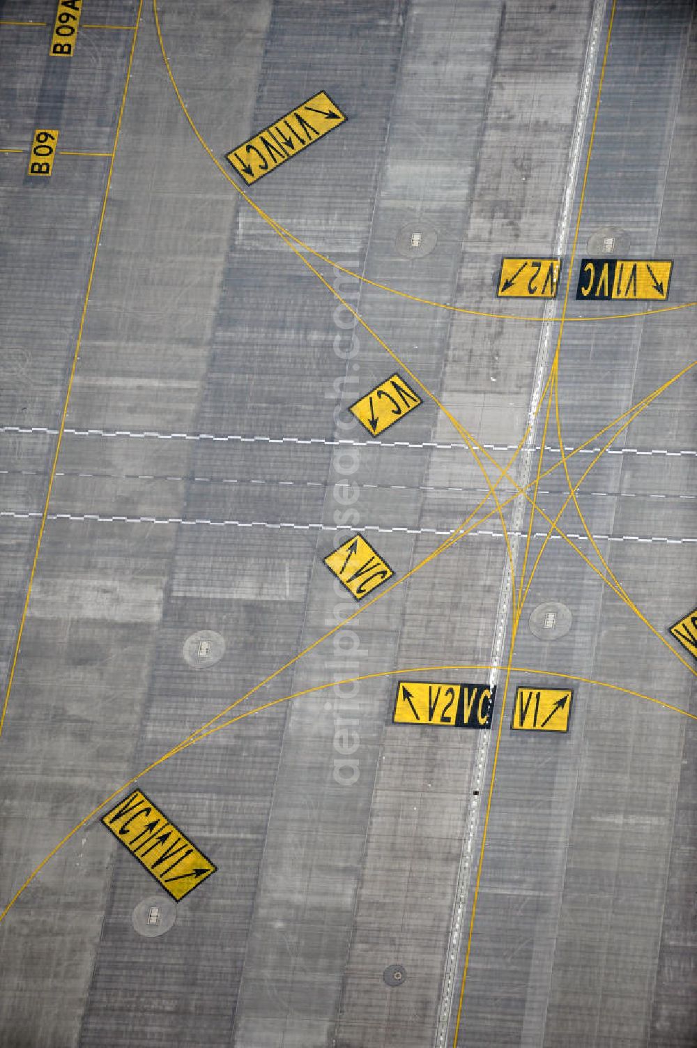 Schönefeld from the bird's eye view: Taxiway markings on the eve of the new terminal at the airport Berlin Schönefeld