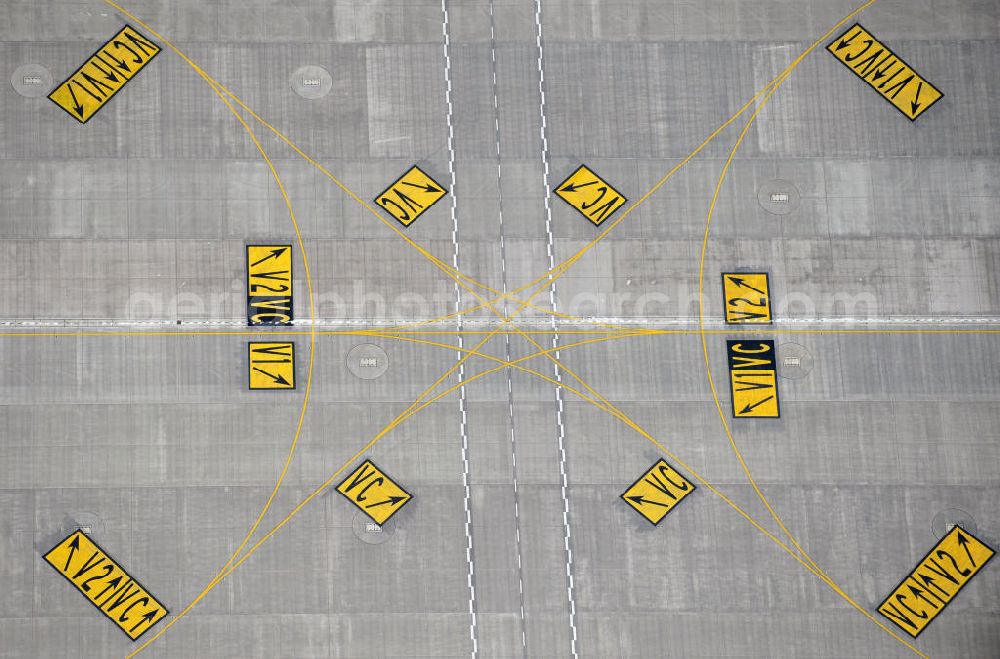 Schönefeld from the bird's eye view: Taxiway markings on the eve of the new terminal at the airport Berlin Schönefeld