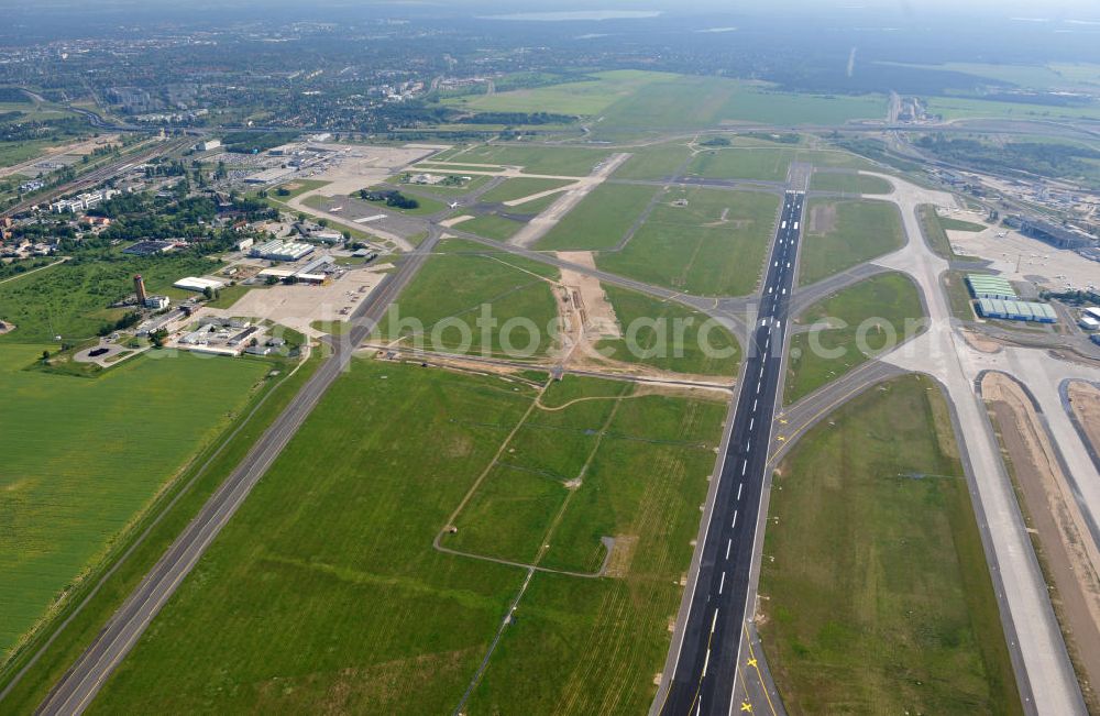 Schönefeld from the bird's eye view: View of the taxiway and the runway on take-off and Airport Berlin-Schönefeld