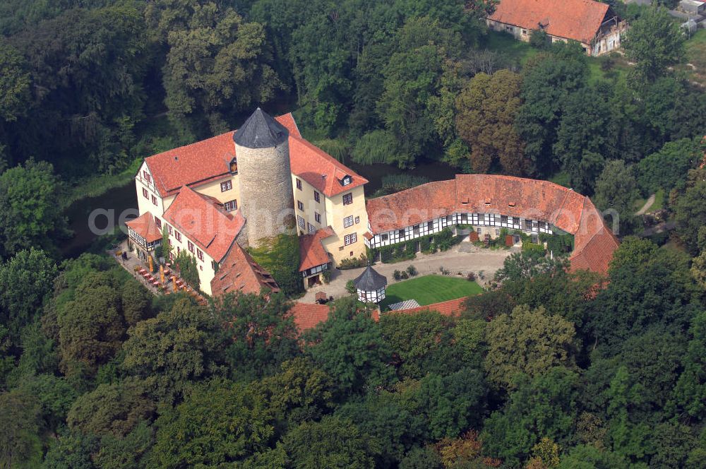 Aerial image Dedeleben-Westerburg - Blick auf die seit Juni 2000 als Hotel umgebaute Westerburg. Sie ist die älteste und besterhaltene Wasserburg Deutschlands und Teil der Strasse der Romanik. Telefon: 0(49)39422-955-0; Fax: 0(49)39422-955-66; e-mail: lerche@hotel-westerburg.de Dedeleben-Westerburg 2007/08/07 This building is the oldest well-preserved moated castle in Germany. In June 2000 the Westerburg was altered into a hotel. It is part of the Strasse der Romanik.