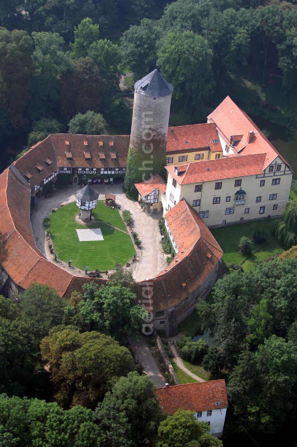 Dedeleben-Westerburg from the bird's eye view: Blick auf die seit Juni 2000 als Hotel umgebaute Westerburg. Sie ist die älteste und besterhaltene Wasserburg Deutschlands und Teil der Strasse der Romanik. Telefon: 0(49)39422-955-0; Fax: 0(49)39422-955-66; e-mail: lerche@hotel-westerburg.de Dedeleben-Westerburg 2007/08/07 This building is the oldest well-preserved moated castle in Germany. In June 2000 the Westerburg was altered into a hotel. It is part of the Strasse der Romanik.