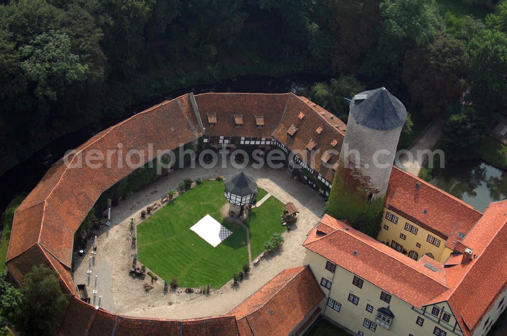 Aerial image Dedeleben-Westerburg - Blick auf die seit Juni 2000 als Hotel umgebaute Westerburg. Sie ist die älteste und besterhaltene Wasserburg Deutschlands und Teil der Strasse der Romanik. Telefon: 0(49)39422-955-0; Fax: 0(49)39422-955-66; e-mail: lerche@hotel-westerburg.de Dedeleben-Westerburg 2007/08/07 This building is the oldest well-preserved moated castle in Germany. In June 2000 the Westerburg was altered into a hotel. It is part of the Strasse der Romanik.