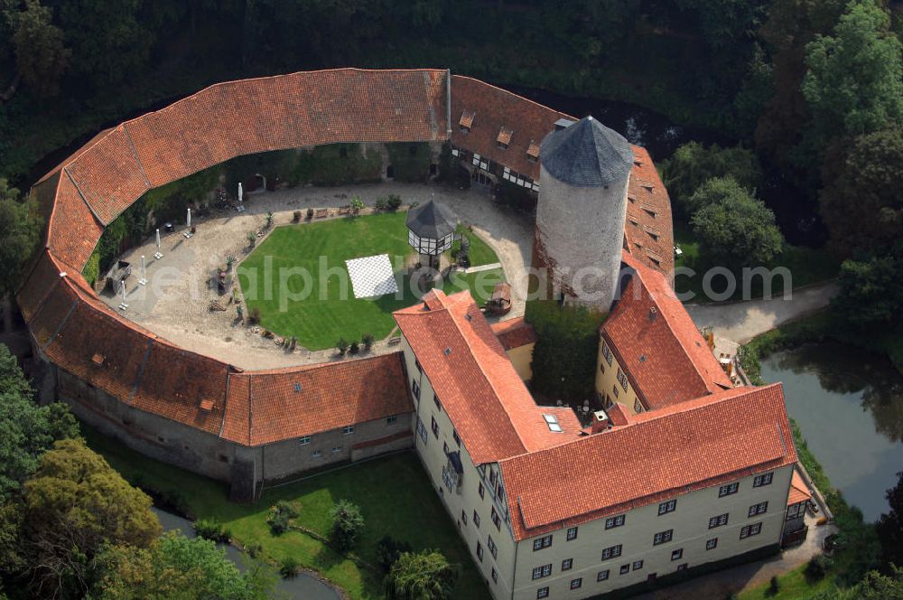 Aerial photograph Dedeleben-Westerburg - Blick auf die seit Juni 2000 als Hotel umgebaute Westerburg. Sie ist die älteste und besterhaltene Wasserburg Deutschlands und Teil der Strasse der Romanik. Telefon: 0(49)39422-955-0; Fax: 0(49)39422-955-66; e-mail: lerche@hotel-westerburg.de Dedeleben-Westerburg 2007/08/07 This building is the oldest well-preserved moated castle in Germany. In June 2000 the Westerburg was altered into a hotel. It is part of the Strasse der Romanik.