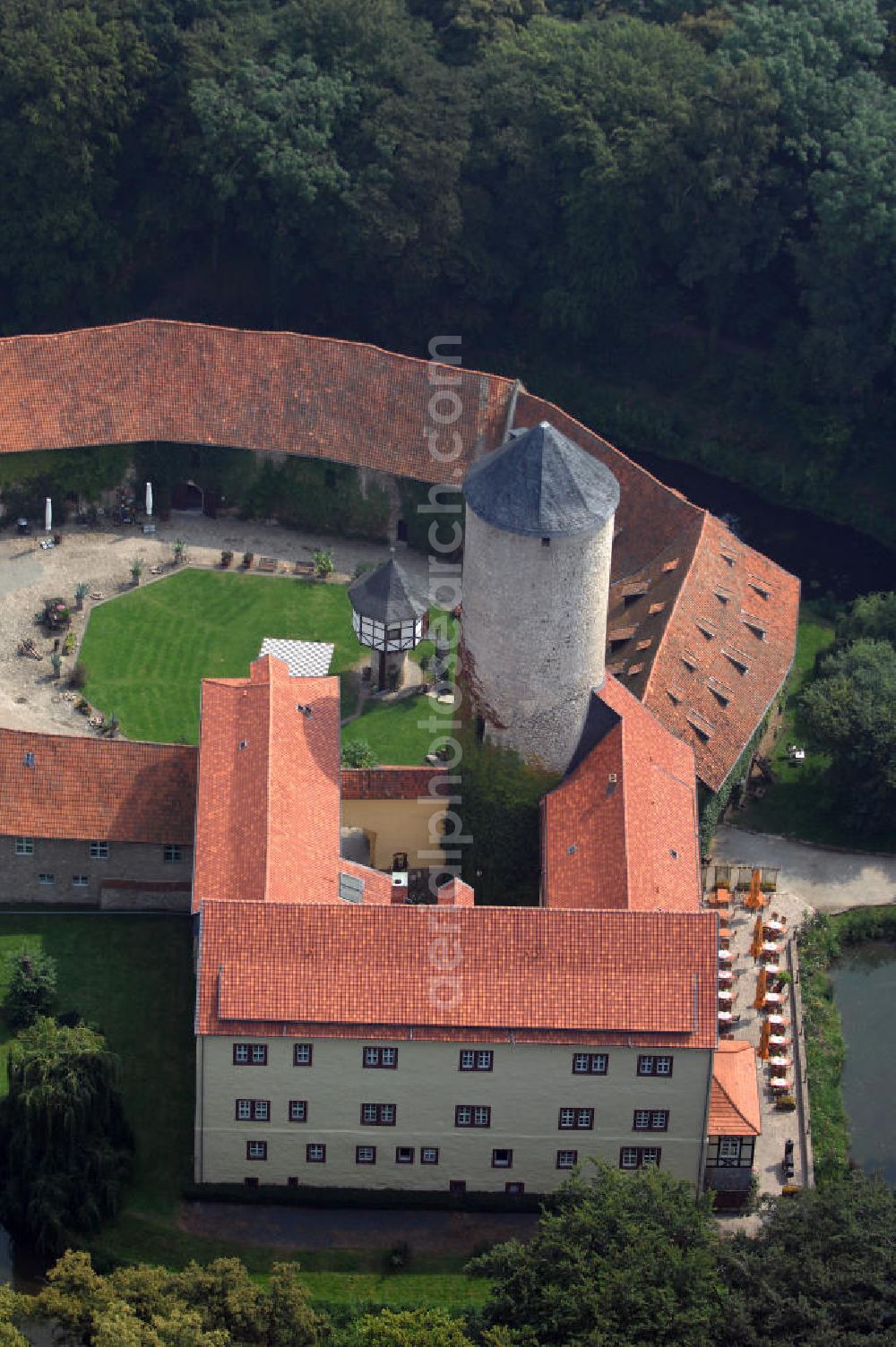 Dedeleben-Westerburg from above - Blick auf die seit Juni 2000 als Hotel umgebaute Westerburg. Sie ist die älteste und besterhaltene Wasserburg Deutschlands und Teil der Strasse der Romanik. Telefon: 0(49)39422-955-0; Fax: 0(49)39422-955-66; e-mail: lerche@hotel-westerburg.de Dedeleben-Westerburg 2007/08/07 This building is the oldest well-preserved moated castle in Germany. In June 2000 the Westerburg was altered into a hotel. It is part of the Strasse der Romanik.