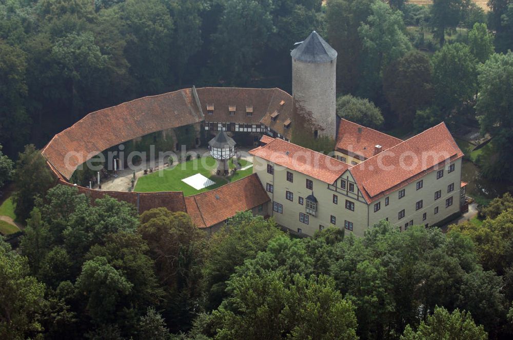 Aerial image Dedeleben-Westerburg - Blick auf die seit Juni 2000 als Hotel umgebaute Westerburg. Sie ist die älteste und besterhaltene Wasserburg Deutschlands und Teil der Strasse der Romanik. Telefon: 0(49)39422-955-0; Fax: 0(49)39422-955-66; e-mail: lerche@hotel-westerburg.de Dedeleben-Westerburg 2007/08/07 This building is the oldest well-preserved moated castle in Germany. In June 2000 the Westerburg was altered into a hotel. It is part of the Strasse der Romanik.