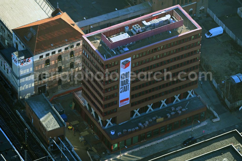 Berlin from the bird's eye view: Construction site for the new building of Rosa-Luxemburg-Stiftung Am Postbahnhof on street Strasse der Pariser Kommune in the district Friedrichshain in Berlin, Germany