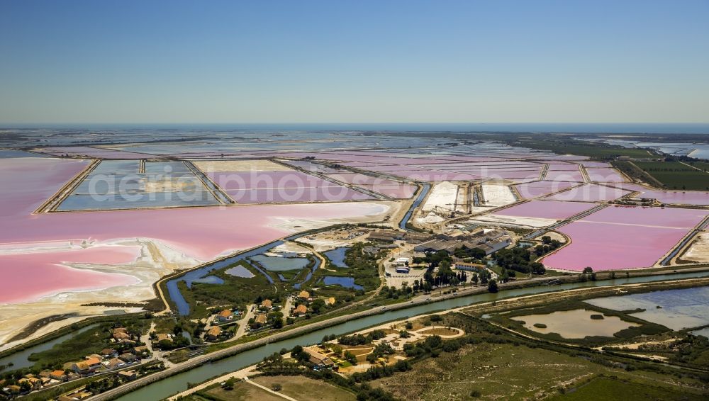 Saintes-Maries-de-la-Mer from above - Colored Salinen- landscape in Saintes-Maries-de-la-Mer in France