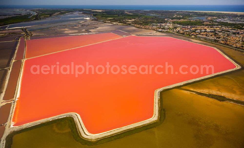 Aerial photograph Saintes-Maries-de-la-Mer - Colored Salinen- landscape in Saintes-Maries-de-la-Mer in France