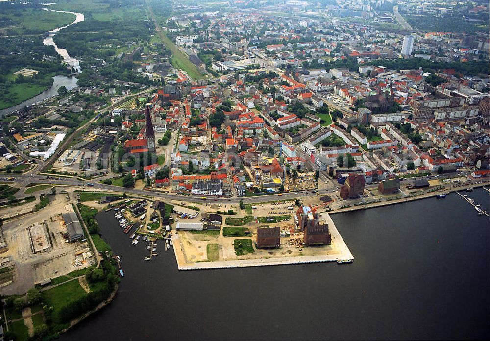 Rostock - Warnemünde from the bird's eye view: Cityscape on the eastern harbor of Rostock (left) and the port city of Rostock on the city center, with St. Peter's Church (left) and St. Mary's Church