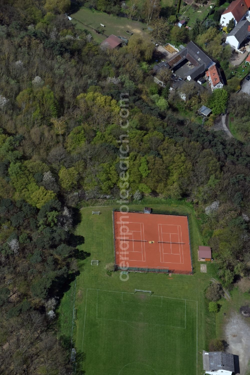 Dornholzhausen from the bird's eye view: Tennis court sports field in Dornholzhausen in the state Hesse