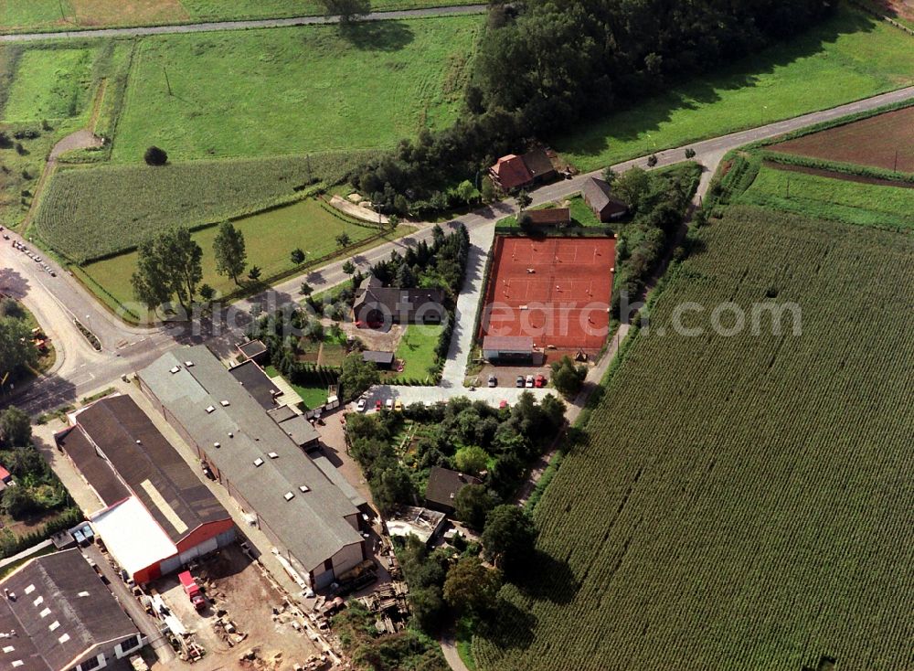 Issum from the bird's eye view: Tennis court sports field am Nordring in the district Sevelen in Issum in the state North Rhine-Westphalia