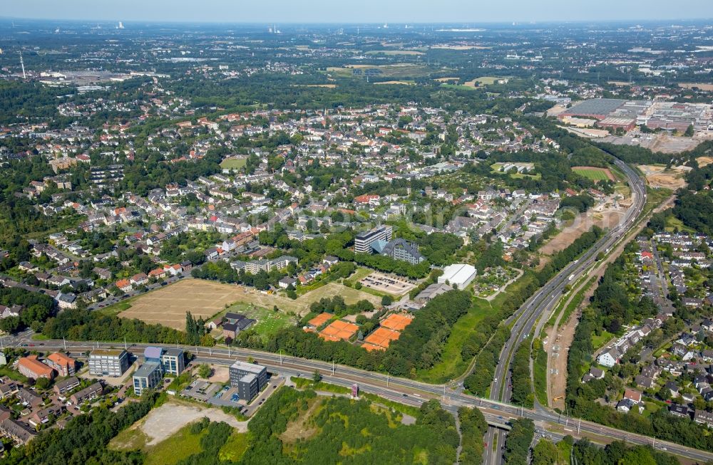 Bochum from the bird's eye view: Tennis court sports field of Tennisgemeinschaft Friederika e. V. at the departure of highway A448 in Bochum in the state North Rhine-Westphalia