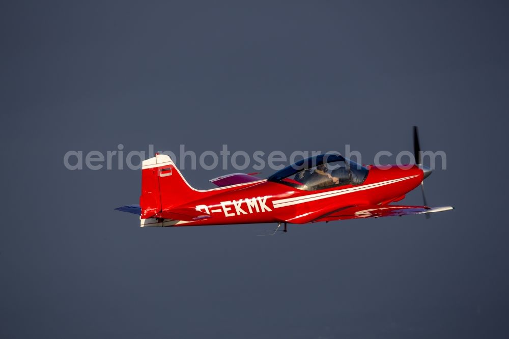 Aerial photograph Hamm - Red Sport Aircraft Falco with the registration D-EKMK in flight in Hamm in North Rhine-Westphalia