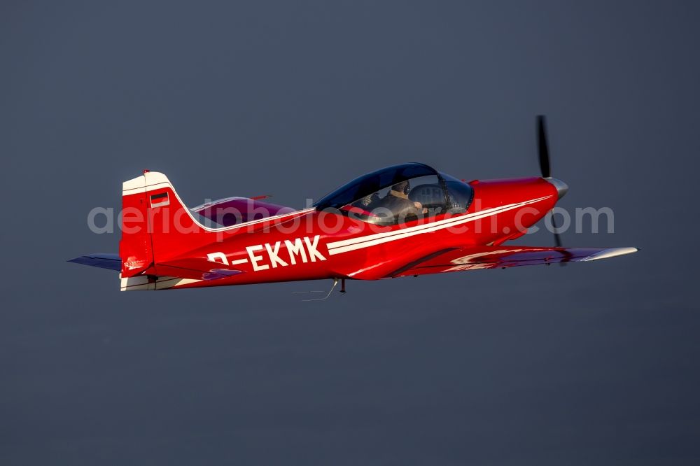 Hamm from above - Red Sport Aircraft Falco with the registration D-EKMK in flight in Hamm in North Rhine-Westphalia