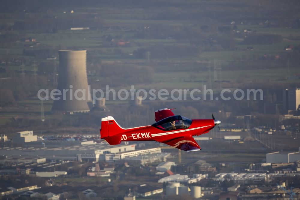 Aerial image Hamm - Red Sport Aircraft Falco with the registration D-EKMK in flight in Hamm in North Rhine-Westphalia