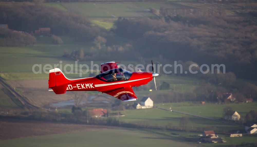 Aerial photograph Hamm - Red Sport Aircraft Falco with the registration D-EKMK in flight in Hamm in North Rhine-Westphalia