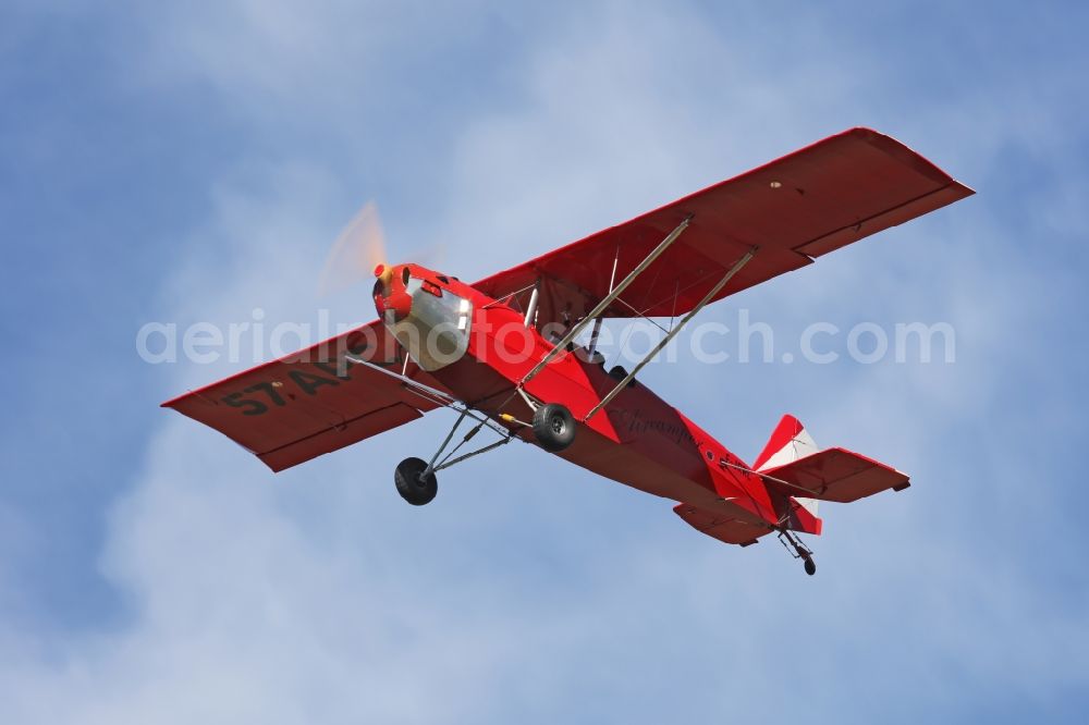 Aerial image Bad Ditzenbach - Ultralight aircraft in flight above the sky Aircamper in roter Farbe mit der Kennung F-JRRL in Bad Ditzenbach in the state Baden-Wuerttemberg