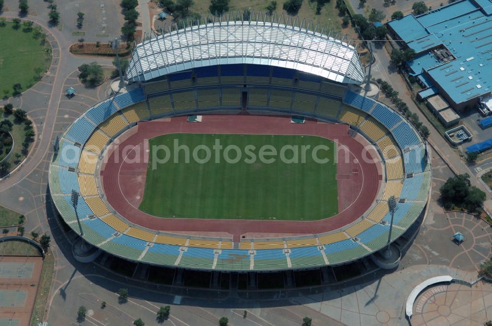 Rustenburg from the bird's eye view: Das Royal-Bafokeng-Stadion (auch Royal Bafokeng Sports Palace) ist ein Sportstadion in Phokeng bei Rustenburg, in der Nordwest Provinz von Südafrika. Das Stadion wurde nach dem Stamm der Royal Bafokeng Nation benannt, in dessen Besitz es sich befindet. Es wurde speziell für die Fußball-Welttmeisterschaft gebaut. View of the Royal Bafokeng Stadium in Rustenburg in the North West Province South Africa for the FI??????????????????