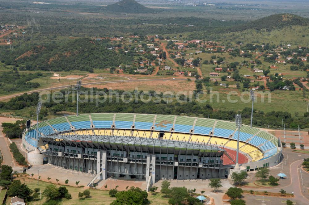 Aerial photograph Rustenburg - Das Royal-Bafokeng-Stadion (auch Royal Bafokeng Sports Palace) ist ein Sportstadion in Phokeng bei Rustenburg, in der Nordwest Provinz von Südafrika. Das Stadion wurde nach dem Stamm der Royal Bafokeng Nation benannt, in dessen Besitz es sich befindet. Es wurde speziell für die Fußball-Welttmeisterschaft gebaut. View of the Royal Bafokeng Stadium in Rustenburg in the North West Province South Africa for the FIFA World Cup 2010.