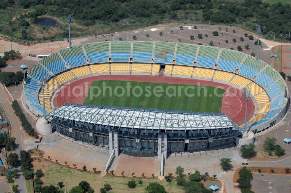 Aerial photograph Rustenburg - Das Royal-Bafokeng-Stadion (auch Royal Bafokeng Sports Palace) ist ein Sportstadion in Phokeng bei Rustenburg, in der Nordwest Provinz von Südafrika. Das Stadion wurde nach dem Stamm der Royal Bafokeng Nation benannt, in dessen Besitz es sich befindet. Es wurde speziell für die Fußball-Welttmeisterschaft gebaut. View of the Royal Bafokeng Stadium in Rustenburg in the North West Province South Africa for the FI??????????????????