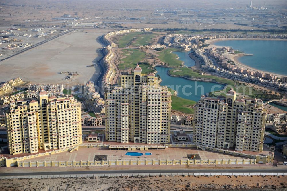 Ras Al Khaimah from the bird's eye view: Complex of Royal Breeze Residence in the arab emirate Ras Al Khaimah. The complex is part of the Al Hamra Village Project, the second largest construction project of Ras Al Khaimah and consists of apartments, penthouses, swimming pools and gardens. The project is realized by the state-owned company Al Hamra Real Estate