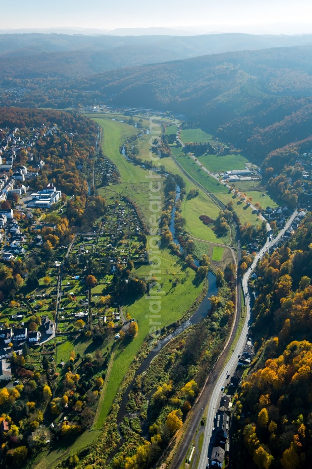 Aerial image Arnsberg - Ruhr valley in the West of Arnsberg in the state óf North Rhine-Westphalia. The river Ruhr takes its course on the edge of the town along a forest and hill