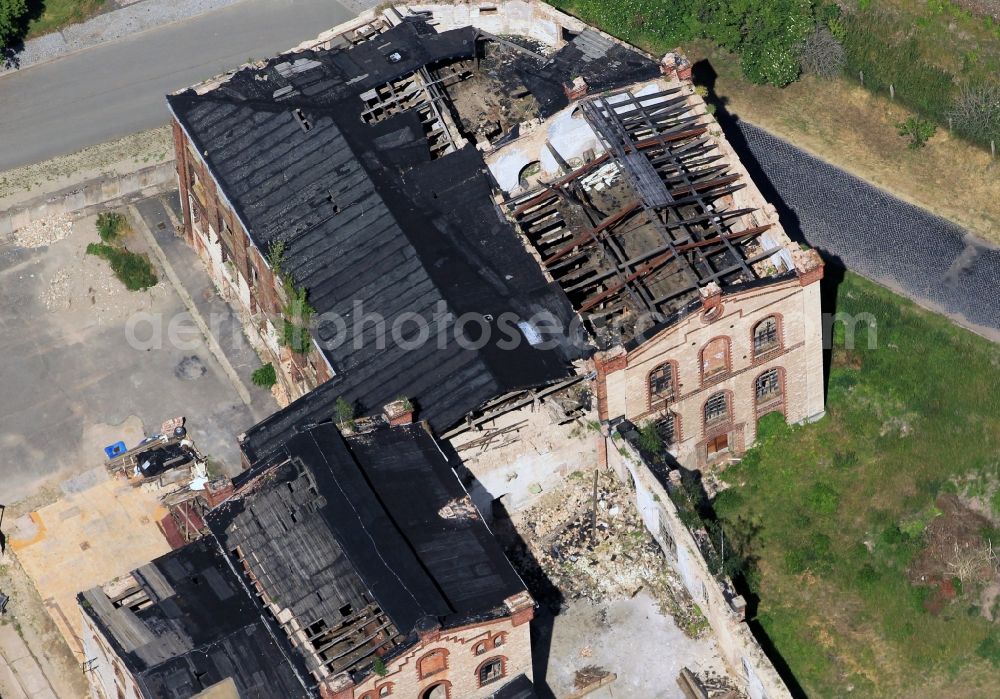 Greussen from the bird's eye view: View at the ruins of the old chocolate factory in Greussen in the state of Thuringia. The old chocolate factory is located on the Schwarzburger street near the train station Greussen