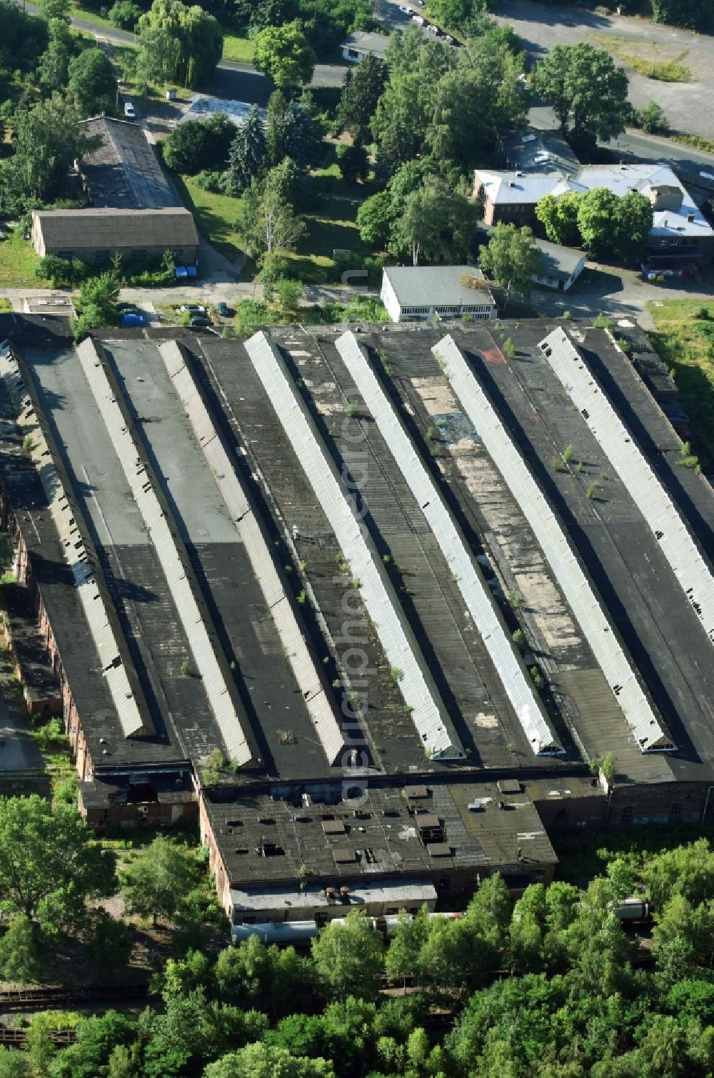 Leipzig from above - Ruins of Repair shop, maintenance and repair of trains and wagons of the freight in the Engelsdorf district of Leipzig in Saxony