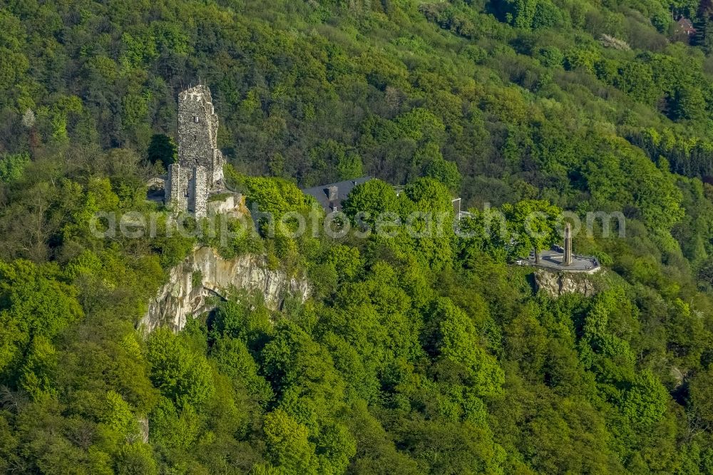 Aerial image Königswinter - View of the Drachenfels castle ruins in the autumn-colored forest at the bank of the Rhine in Königswinter in the federal state North Rhine-Westphalia. After major rock crashes the hilltop was secured by steel anchors and reinforcing steel. Meanwhile, the ruin was renovated