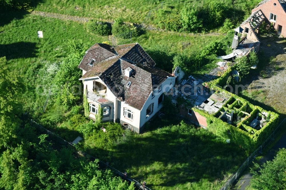 Krummsee from above - Ruin of the former Berghotel Bruhnskoppel in Krummsee in the state of Schleswig-Holstein, Germany