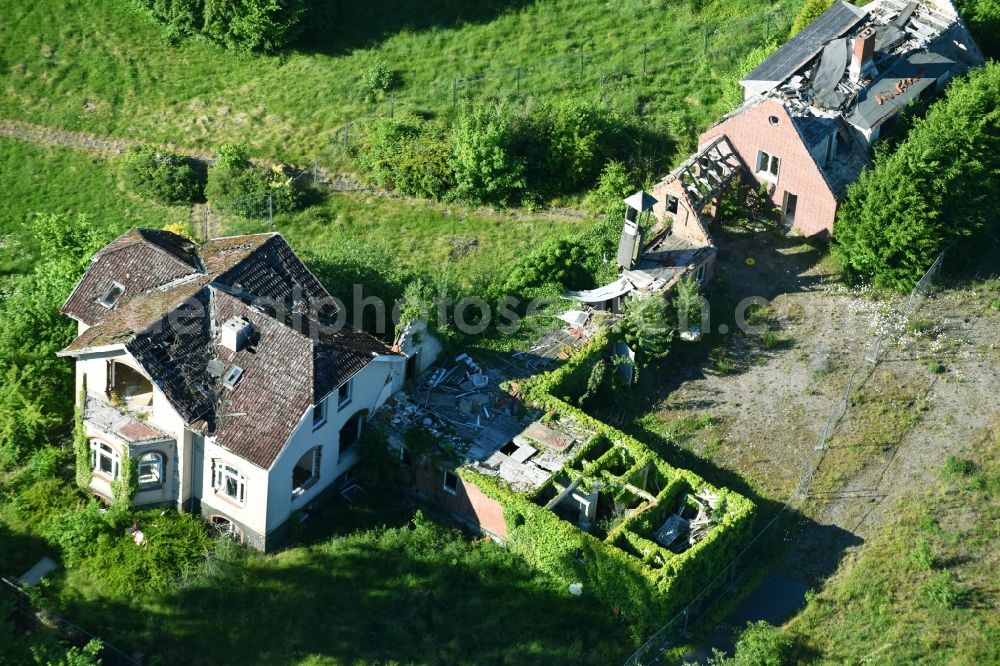 Krummsee from the bird's eye view: Ruin of the former Berghotel Bruhnskoppel in Krummsee in the state of Schleswig-Holstein, Germany