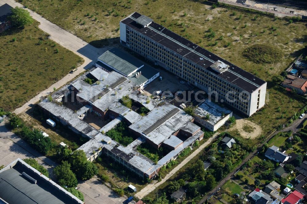 Berlin from the bird's eye view: Ruins of the former office building from the GDR radio center, today used by a shopping center and co-working area on the Nalepastrasse in Berlin, Germany