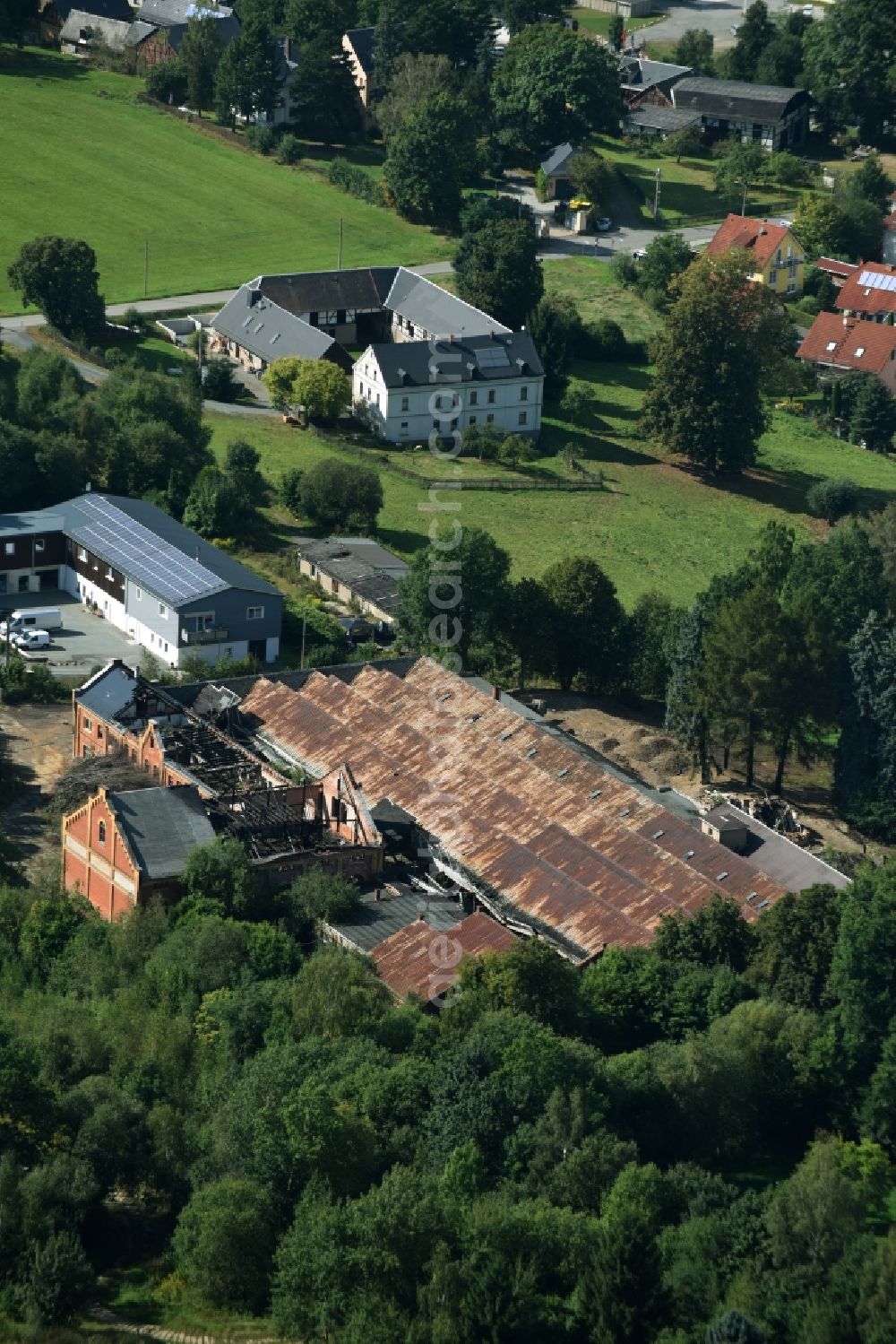 Mohlsdorf from above - Ruins of the former factory - building in der Bahnhofsstrasse in Mohlsdorf in the state Thuringia