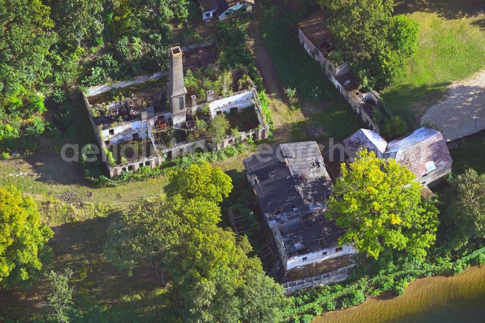 Aerial image Rüdersdorf - Ruin the buildings and halls at the Stienitzsee in Ruedersdorf in the state Brandenburg, Germany