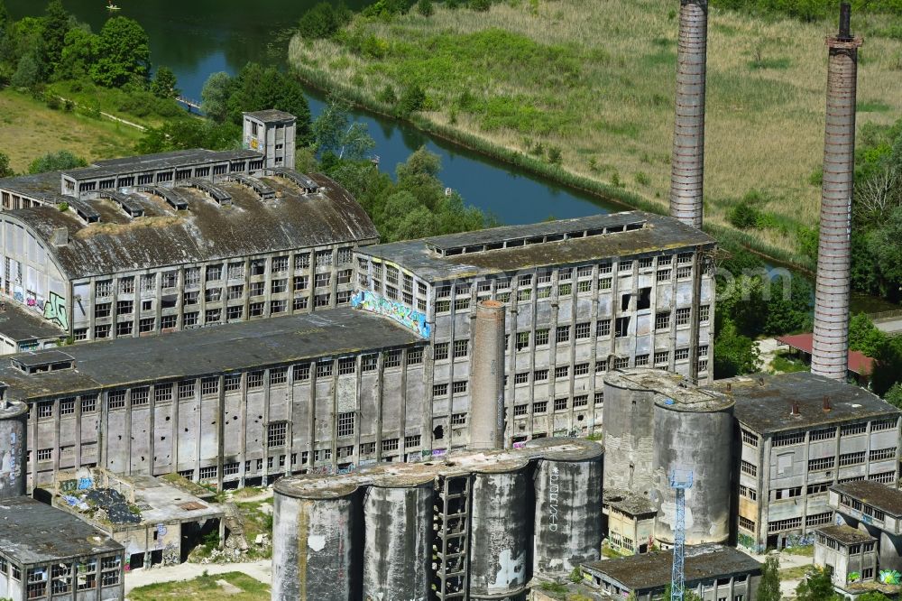 Rüdersdorf from above - Ruin the buildings and halls of Cement and phosphate chemical plant in the district Tasdorf in Ruedersdorf in the state Brandenburg, Germany